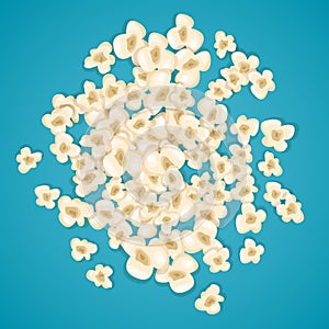 Heap popcorn for movie lies on blue background.