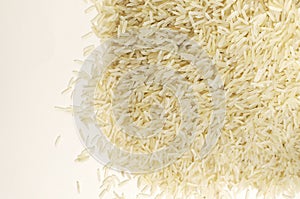 A heap of raw basmati rice. Concept of Water-Conserving Products. Saving water.