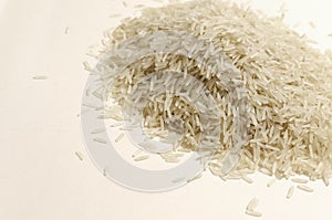 A heap of raw basmati rice. Concept of Water-Conserving Products. Saving water.