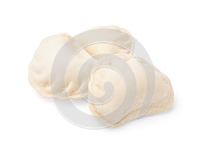 Heap of raw dumplings (varenyky) with tasty filling on white background