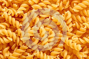 Heap of raw rotini or fusulli pasta