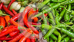 Heap of red and green Cayenne pepper (Capsicum annuum)