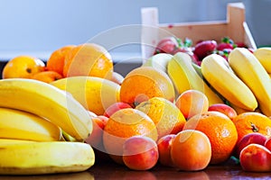 Heap of ripe fruits on kitchen
