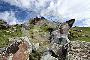 Heap of rocks in the valley in Caucasus mountains