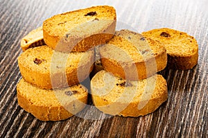 Heap of rusks with raisin on table