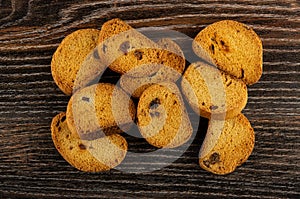 Heap of rusks with raisin on table. Top view