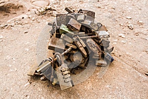 Heap of rusty padlocks representing love and brotherhood. locks joined together