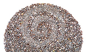 Heap of sermicircular shaped chia seeds. Top view. Macro close-up. With copy space