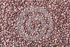 heap of small bronze nuggets background