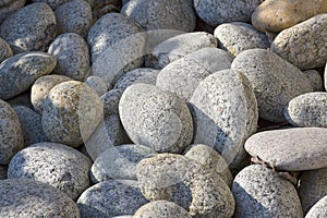 Heap of smooth pebble stones, background.