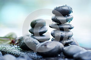 Heap of spa stones with water drop still life style