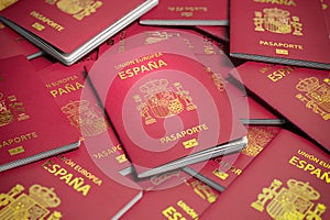 Heap of Spain passports. Immigration, citizenship, travel and tourism concept