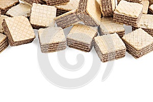 Heap square wafer biscuits isolated on white background