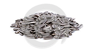 Heap of sunflower seeds isolated on white