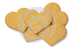 Heap of sweet cookies in heart shape isolated on white background