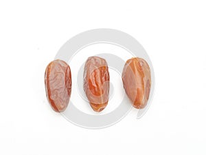 Heap of tasty dry dates or dates palm or palm phoenix dactylifera fruit isolate on a white backdrop.