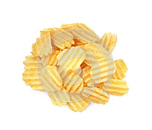 Heap of tasty ridged potato chips on white background, top view