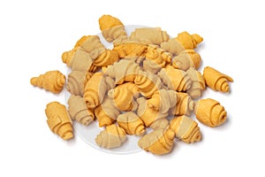 Heap of traditional Krichlate spicy miniature shortbread cookies isolated on white background