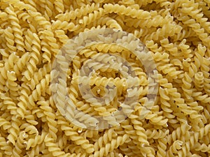 Heap of uncooked Fusilli pasta