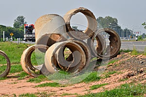 Heap of unused culverts beside the road