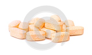 Heap of Vitamin C tablets photo