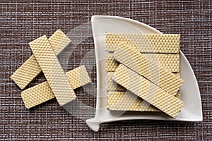 Heap of wafers in plate, top view