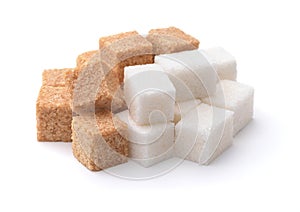 Heap of white and brown sugar cubes