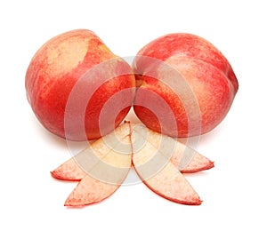 Heap of whole peaches and slices