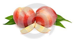 Heap of whole peaches and slices