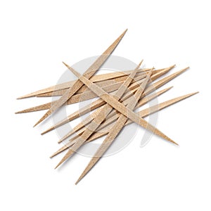 Heap of wooden toothpicks isolated on white background