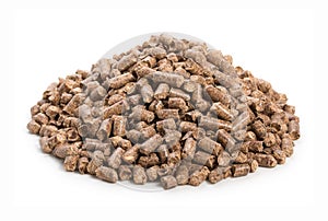 Heap of woody clumps, pellets of litter, for cat, rabbit, guinea pig, hamster, rodent, bird, turtle and other pets, isolated on a