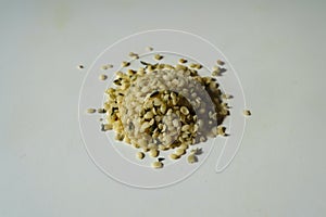 Heap of yellow shelled hemp seeds