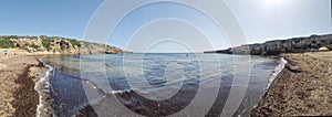 Heaps and beds of seagrass seaweeds Posidonia oceanica on the sand beache of Calamosche, Sicily photo