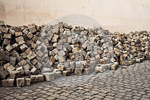 Heaps of cobblestones, pavement construction, Prague.