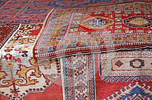 Heaps of valuable oriental carpets