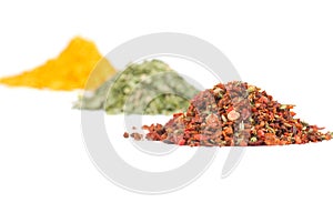 Heaps of various ground spices