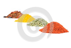 Heaps of various ground spices