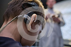 Hearing Aid in Boy`s Ear