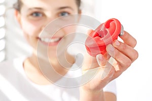 The hearing aid for a child