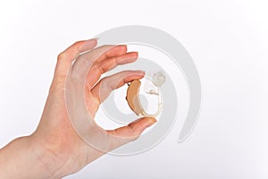 Hearing aid with ear mould and tubing