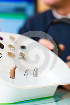 Hearing aid on a presentation table