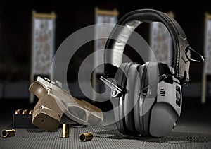Hearing protection with ammo and a pistol