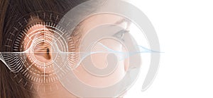 Hearing test showing ear of young woman with sound waves simulation technology