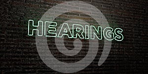 HEARINGS -Realistic Neon Sign on Brick Wall background - 3D rendered royalty free stock image photo