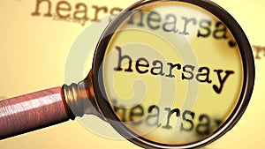 Hearsay and a magnifying glass on English word Hearsay to symbolize studying, examining or searching for an explanation and photo