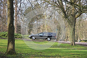 Hearse on a cemetery