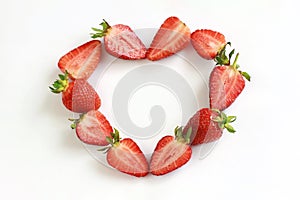 Heart of appetizing strawberries on a white background