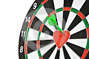 Heart and arrow on dart board