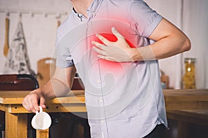 Heart attack, man with chest pain suffering at home