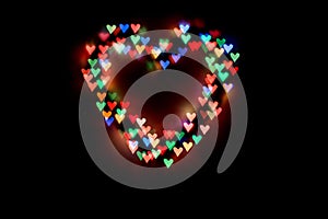 Heart of bright colored hearts-bokeh.Background for lovers